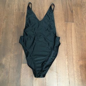 Black high thigh one piece